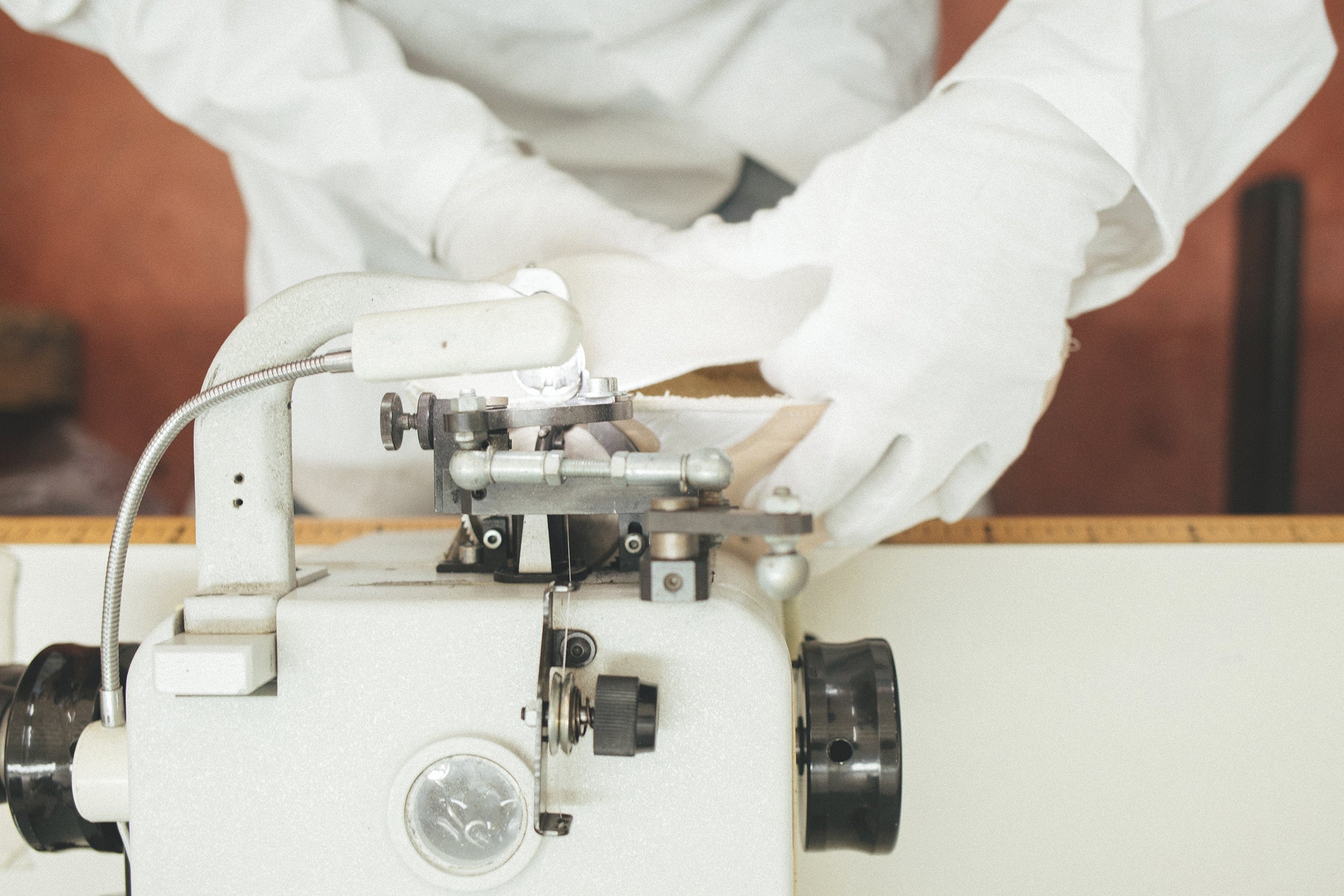 Top view of stitching Mason Garments sneakers in the factory