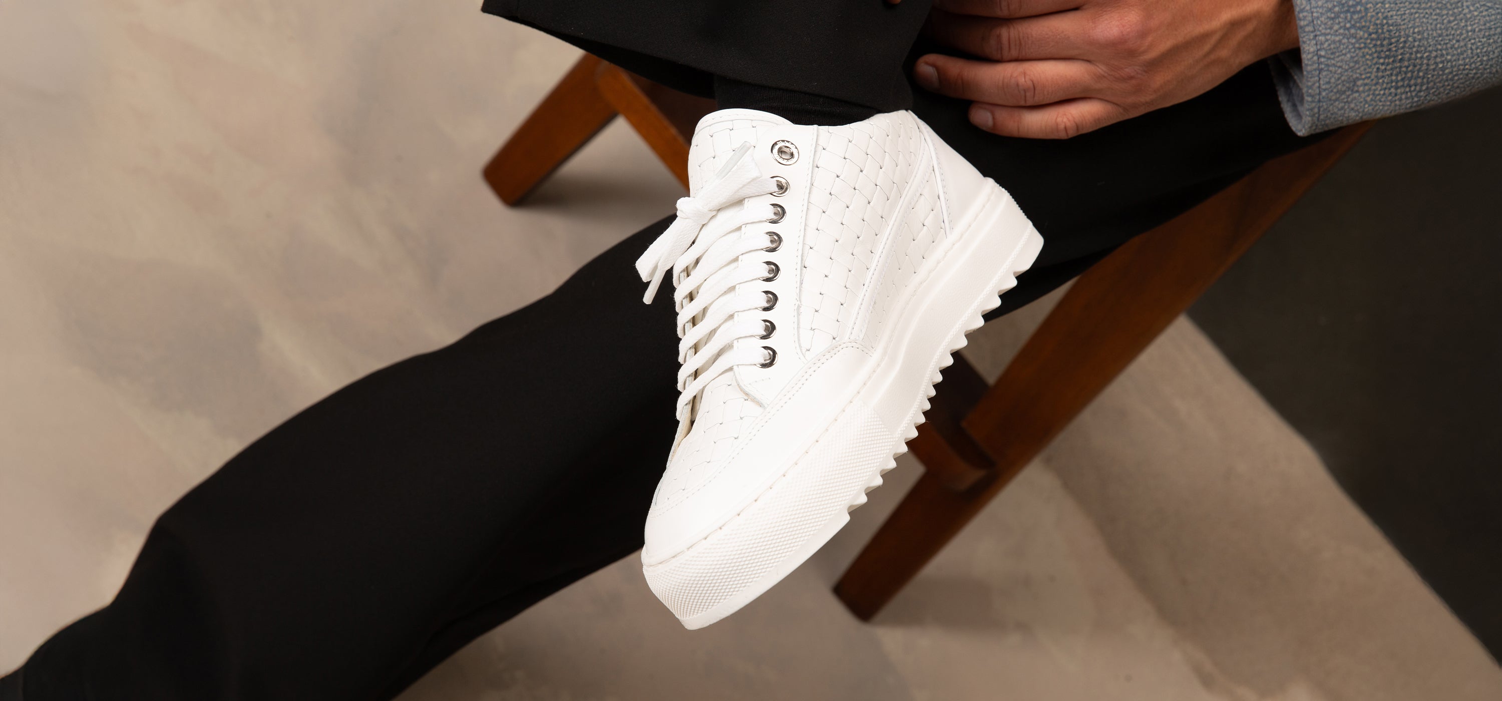 White textured sneakers on-feet