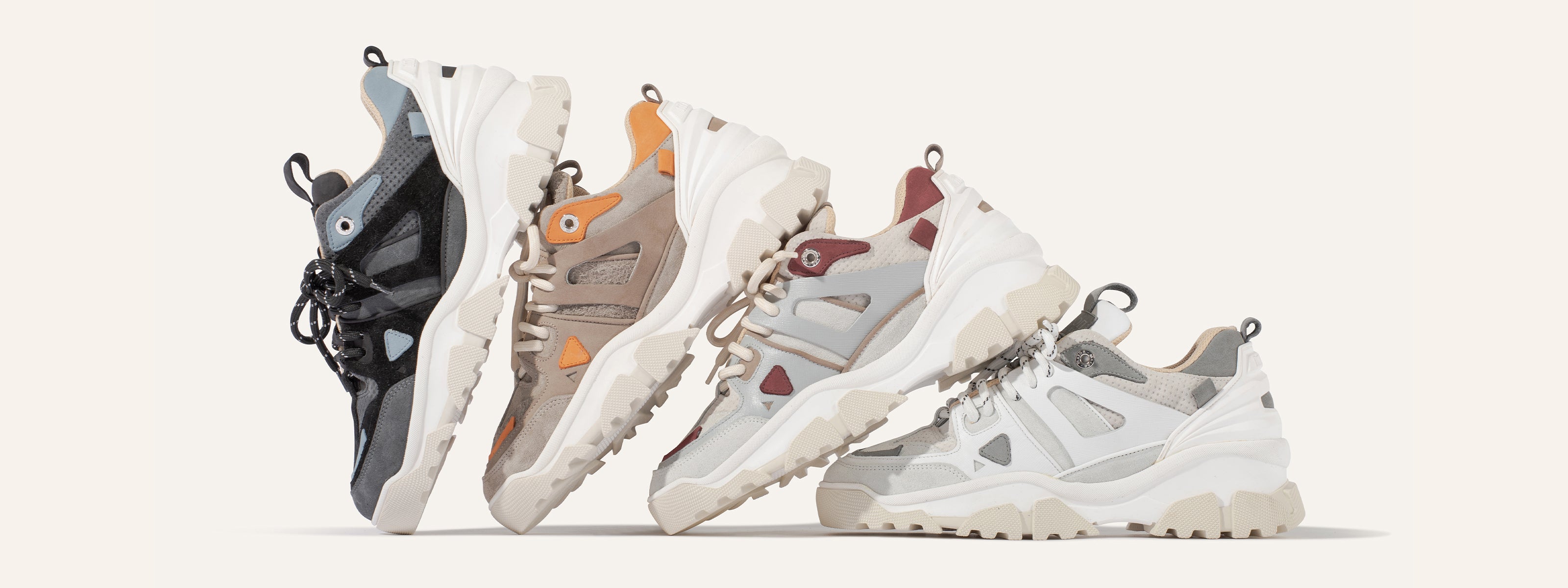 Four Genova sneakers in various colors on a white background