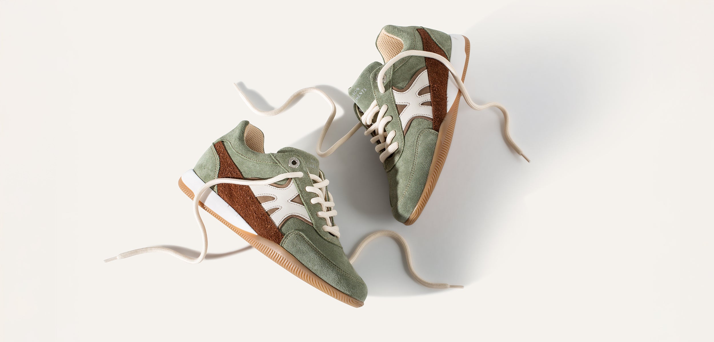 Olive green Maranello sneakers flatlay on white background